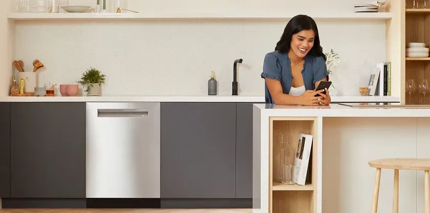 bosch-800-series-dishwasher-woman-kitchen